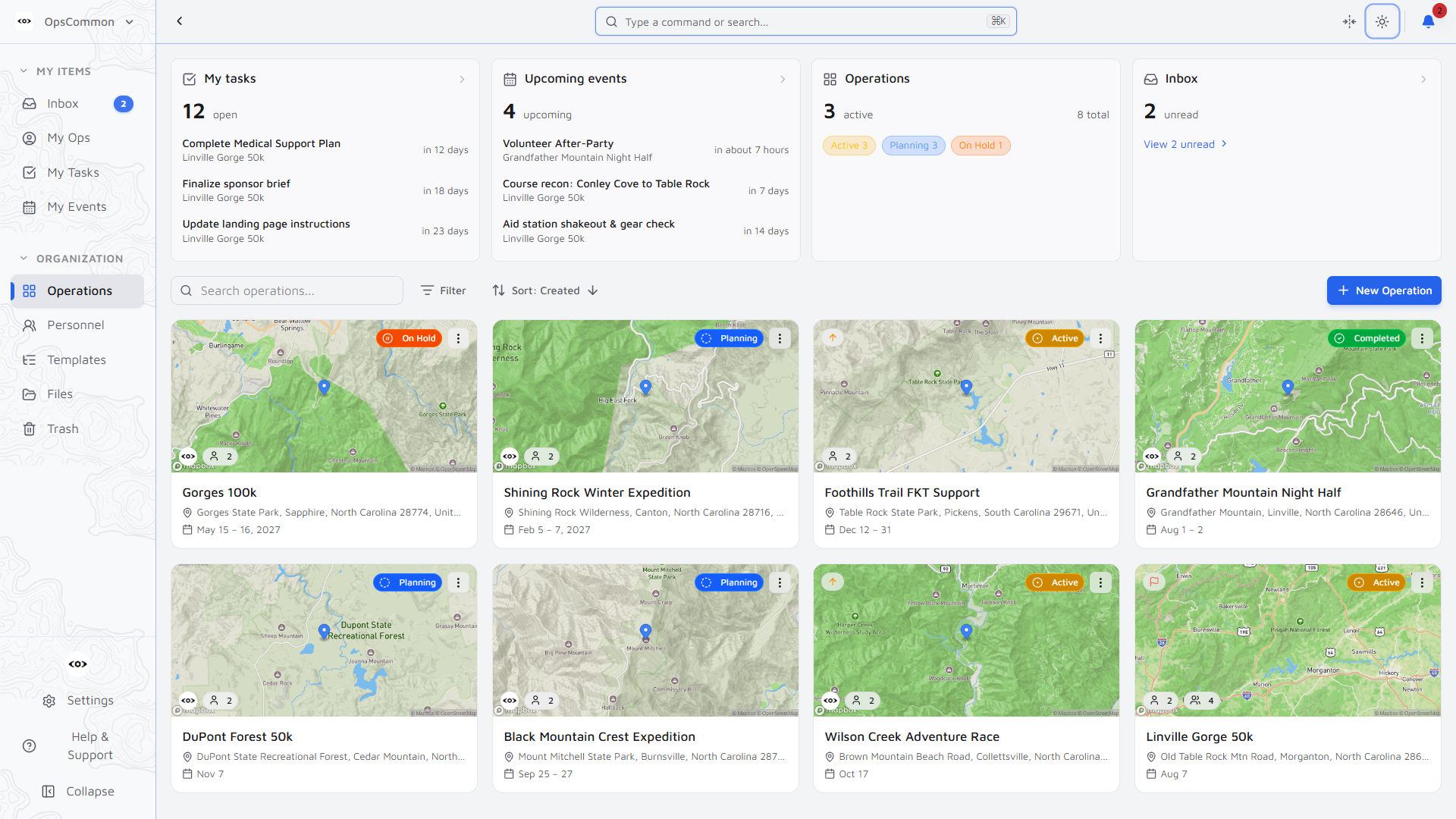 OpsCommon operations index — cards for each operation with map thumbnails and status badges, plus open tasks, upcoming events, and inbox summaries